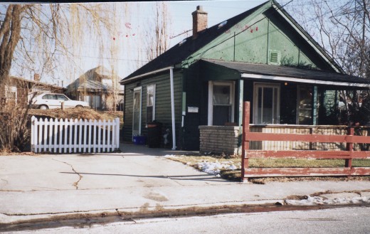 1028 Lakeshore Rd., one of six cottages owned by Mr. Terry.  AAA  This cottage was demolished in 1989. Note the second row of cottages in background which are located along the beach.