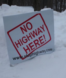 Hundreds of these signs dotted the back roads of north Burlington.  The locals do not want any road cutting through “their” community.