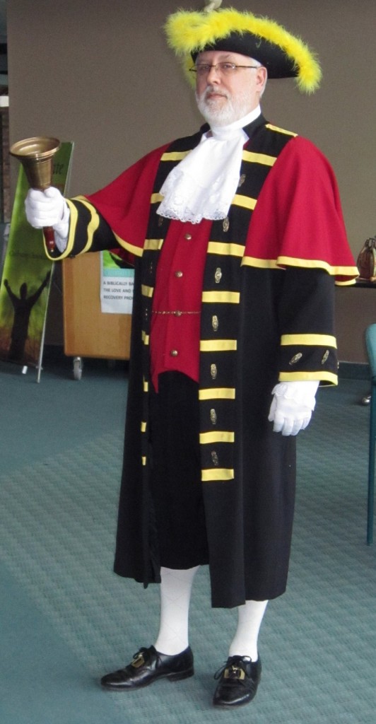 Costs $50. to clean and press the uniform – but he is pretty isn’t he.  David Vollick as a Town Crier.