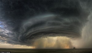 Massive cloud formation that pulled itself into a funnel to wreck havoc on a community.  Awesome power.