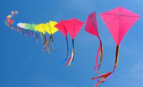 Kite flying string of kites A blue sky and string upon string of kites. Great family fun. Don’t miss it.