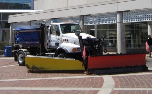 Snow plow city hall sq The plow is to remind you that the snow is going to come again and that the plow is there to move it when it does return. Say thank you to the plow.