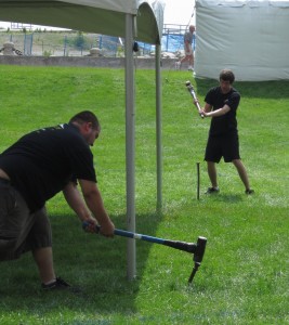 Getting the tents set up and the stages with all their sound equipment in place took a couple of days – and a lot of hard work.  Swinging that mallet was not easy – and he never missed the stake in the ground – not once.