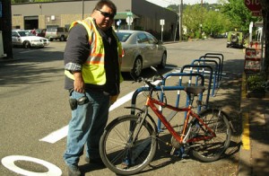 We have much nicer bike racks – perhaps our Mayor can license our design to Portland.