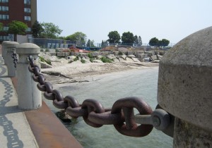 Mother nature created this nice little beach for us – and now the engineers want to construct a stairway from the deck to the water level.  Why not just open up the anchor chain on the Promenade to the water level.  What will you bet that there is an insurance reason for not being able to do that?