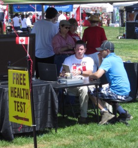 Canada Day 2011 was as good as the weather gets in Ontario during the summer.  A light breeze with ice cream and hot dogs available for the hungry and various service available to others.  A free health test was obviously of interest to one young man.
