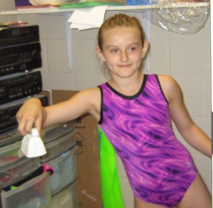 Xxx xxx rings the cowbell to signal to her peers that she has perfected a routine and wants to show her peers what she is now able to do.  The bell doesn’t get rung often – it takes hours and hours to perfect a routine – and it all comes together at the Burlington Gymnastics Club Spring cup event where Burlington athletes compete against others in the province.