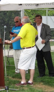 Those yellow shorts belong to one of the city’s General Manager’s – and it isn’t Kim Phillips.  It was a “casual” event.