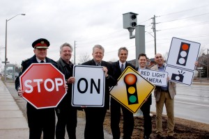 From left to right: Halton Chief of Police, Gary Crowell; Oakville Councillor Marc Grant; Oakville Mayor Rob Burton; Halton Regional Chair Gary Carr; and Oakville Councillors Tom Adams and Max Khan. Note that the only people smiling are the politicions. The police chief is going to have to enforce this law.