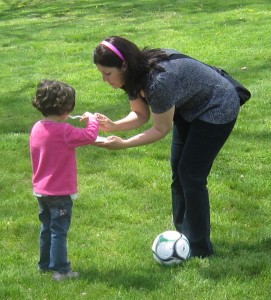 Mother child eating cake LaSalle Park May 2012