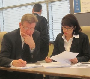 Councillor Sharman and Director of Transit Donna Shepherd working trhrough a budget document