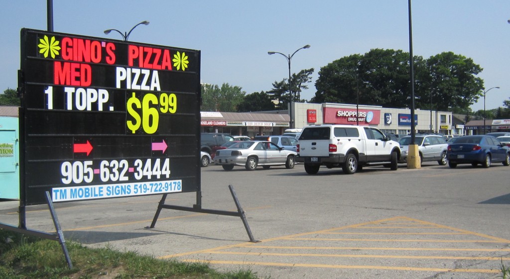 Sign at Guelph Line north of new street. Are their days numbered?