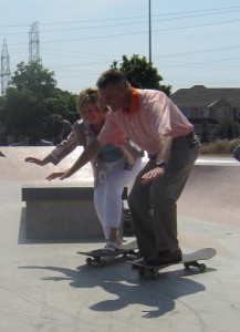 Ward Councillor Blair Lancaster and Mayor Rick Goldring put their political repitations on the line and stand on skate baords.  Is there one foot on the ground there?  