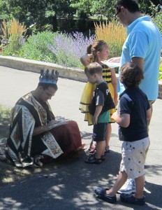 Oberon, the Dwarf King signed documents for all the pixies that passed by.