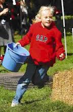 Girl running with bucket HCWF