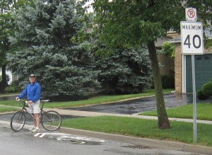 Special lanes for bicycles and the speed at which vehicles travel along city roads are an ongoing concern for Rob Nxx who stands here beside recently painted sharrows on city streets.