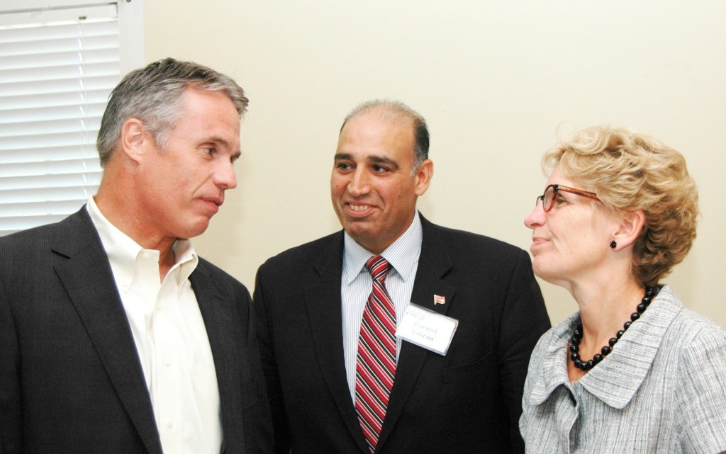 Mayor Goldring chats with then Minister of Transportation Kathleen Wynne.  He wasn't buying what she was selling then.  Saturday the Mayor will squire the Premier around Ribfest.