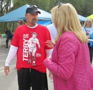 Casey Cosgrove talks with Deb Tymstra about the crowd he brought with him to the 2013 Terry Fox Run.
