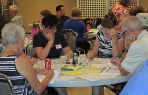 Teresa Seaton, organizer of the Art in Action Tour, thinks through a response at one of the Cultural Action Plan sessions. She is one of 250 people organized as an Arts and Culture Collective in Burlington.