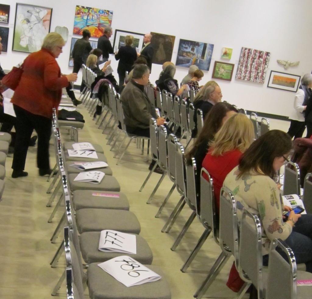 Art Sale - bid books on chairs