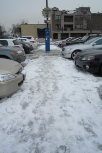 The view looking south in lot 4 off John Street - notice how they managed to clear the sidewalk in front of the meter but not for the path to the meter.