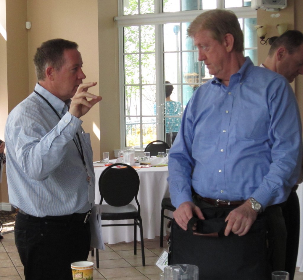 Frank McKeown, then the Mayors Chief of Staff explains a concept to Ward 5 Councillor Paul Sharman. McKeown was described as the 7th council member during the Strategic Plan sessions.