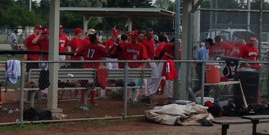 Bandits Burlington players celebrate the end of a double-header