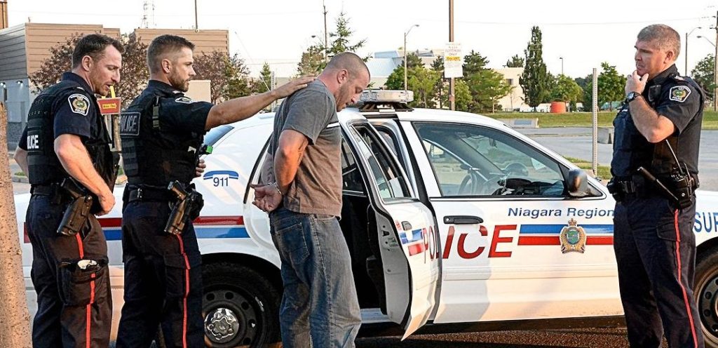 Bracken being arrested