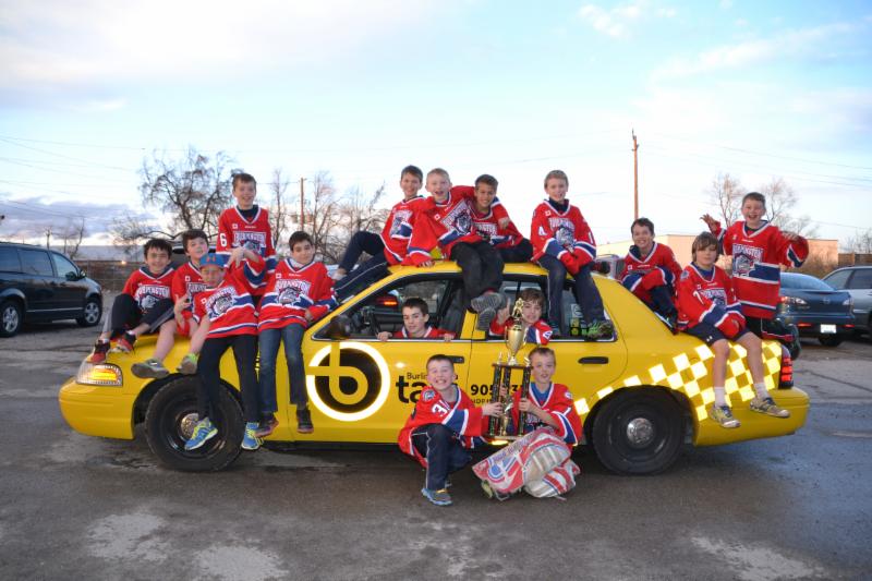 Burlington taxi with kid hockey players