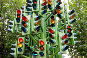Lot of traffic lights at big pole