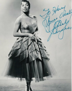 Ella Fitzgerald inked a picture with an autograph.think