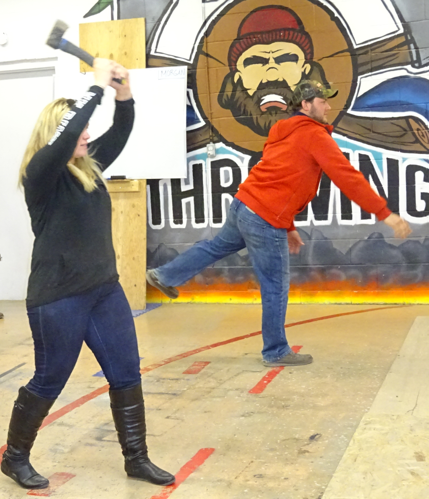 Female - dutch and male red sweater throwing