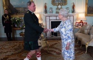 Queen Elizabeth II, in her capacity as Colonel-in-Chief of the Argyll and Sutherland Highlanders of Canada, receives Colonel Ronald Foxcroft (Honorary Colonel) at Buckingham Palace in London.