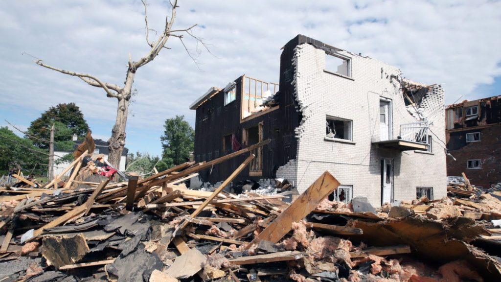 A damaged apartment building is seen in Gatineau, Que. on Sunday, September 23, 2018. Houses and Apartment buildings had roofs torn off and windows blown out and automobiles were damaged after a tornado caused extensive damage on Friday to a Gatineau neighbourhood forcing hundreds of families to evacuate their homes. THE CANADIAN PRESS/Fred Chartrand