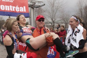 Krista Duchene being carried after Montral race