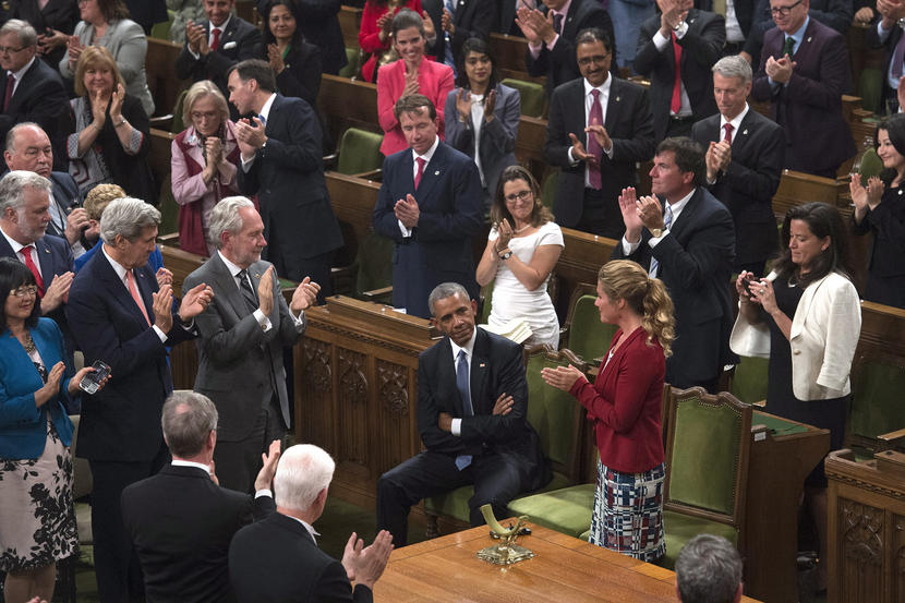 President Barack Obama receives a standing ovation from guests as he is introduced by Canadian Prime Minister Justin Trudeau in the House of Commons on Parliament Hill in Ottawa, Canada, Wednesday, June 29, 2016. (Adrian Wyld/The Canadian Press via AP) MANDATORY CREDIT