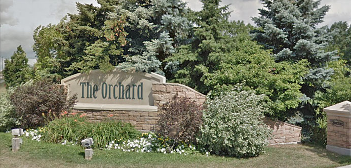Orchard community entrance sign