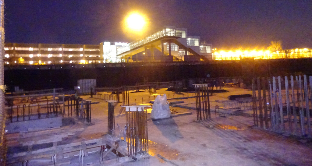 Site with GO in background before sunrise