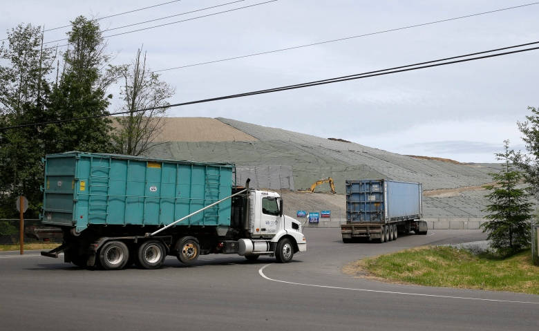 Trucks entering landfill site