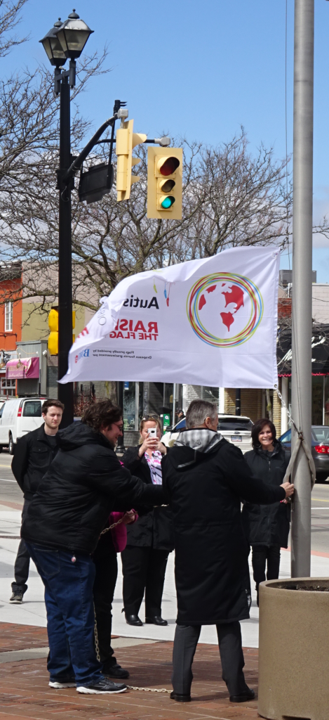 autism flag raising