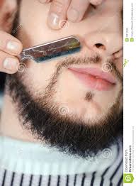 barber shaving beard