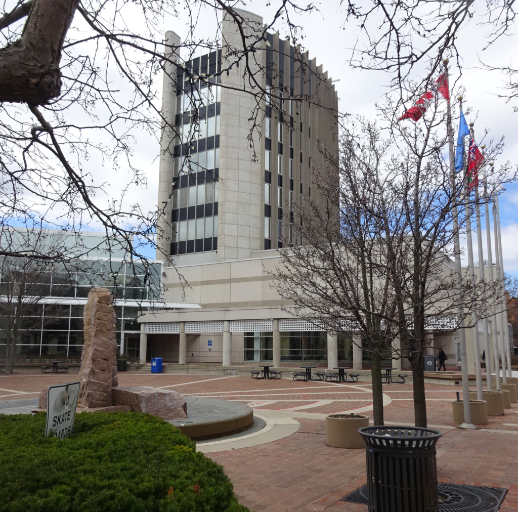 city hall with flag poles