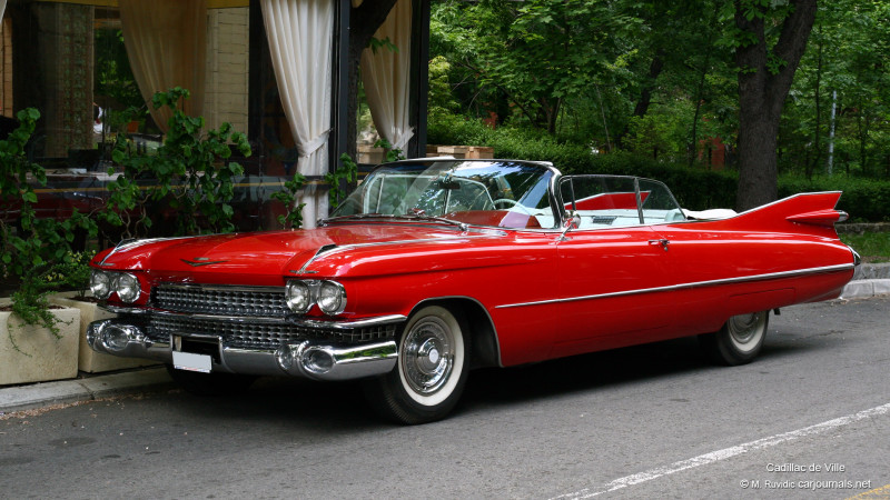 red cadillac with fins