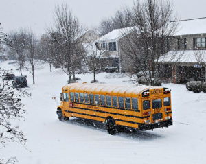 school bus in snow fall