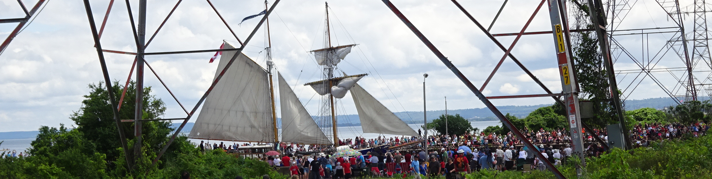 ships canal - crowd watching ship passing