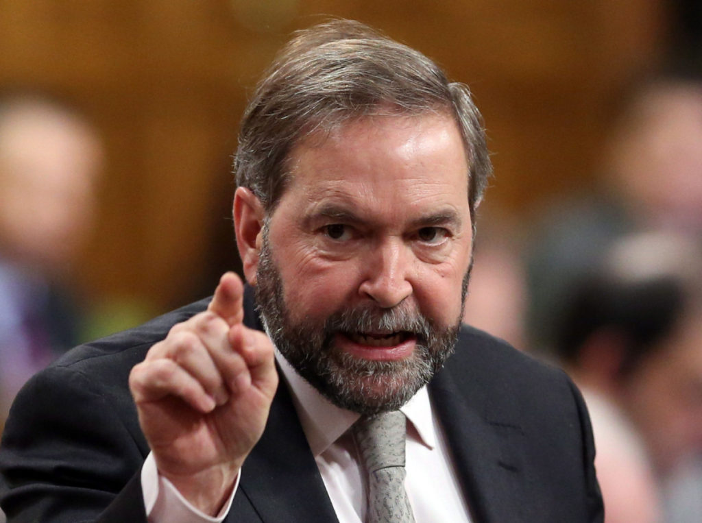 Opposition Leader Thomas Mulcair stands in the House of Commons during Question Period on Parliament Hill in Ottawa Wednesday December 12, 2012. THE CANADIAN PRESS/Fred Chartrand